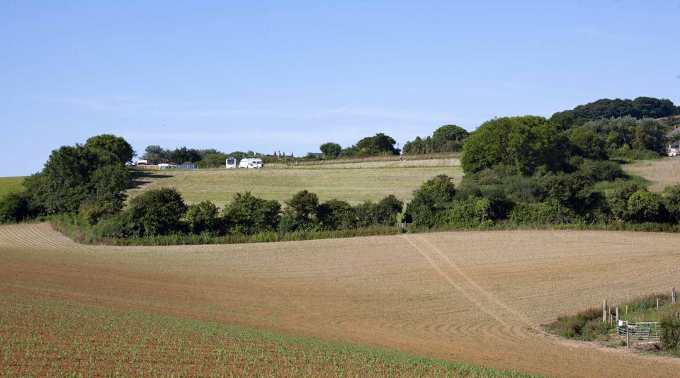 Caravans above the fields