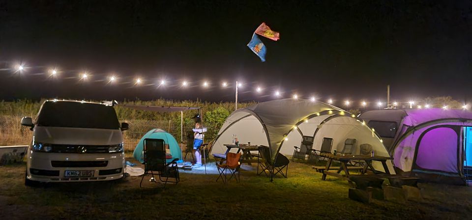 Pitches under festoon lights at night