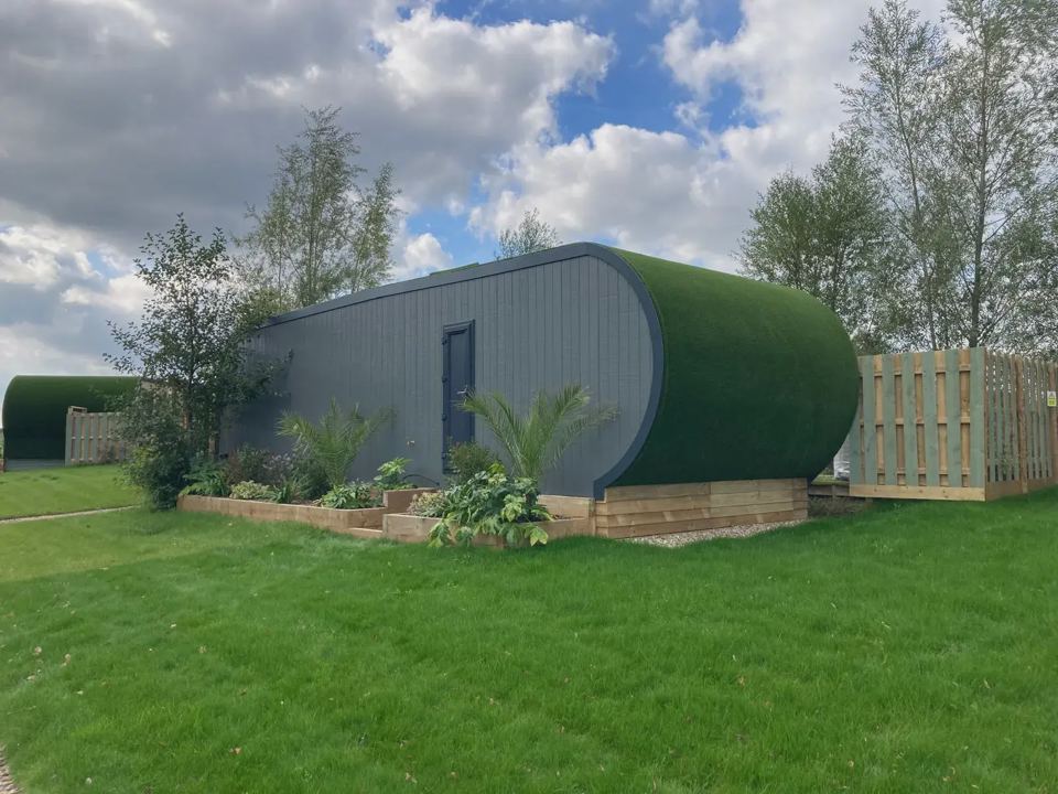 Lodge with lawn and planting