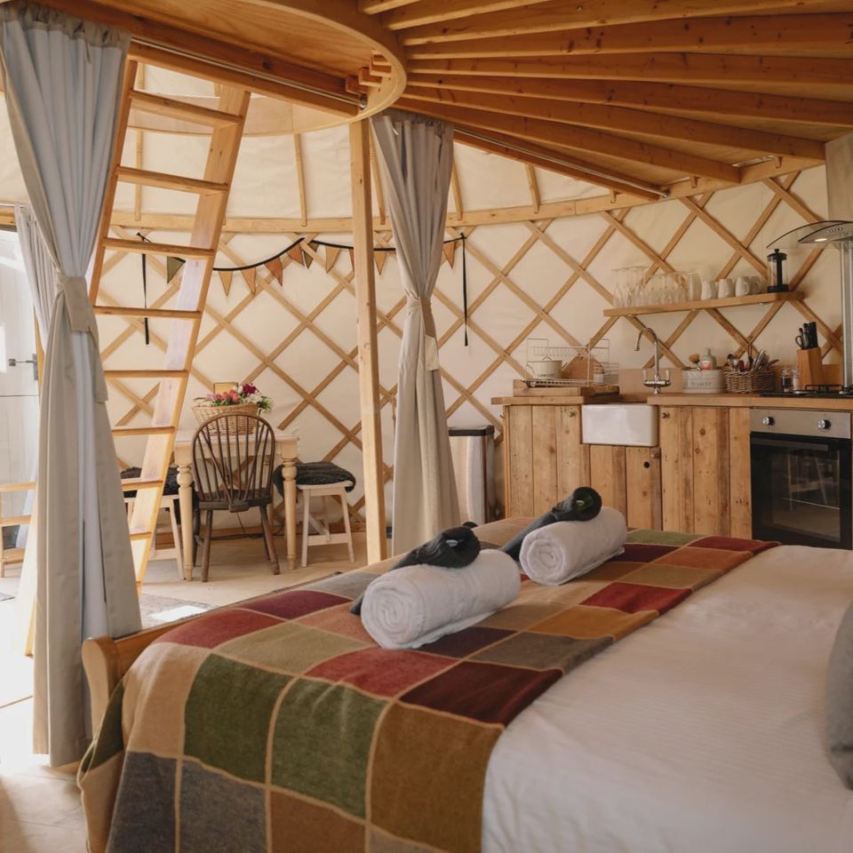 Inside a yurt with double bed
