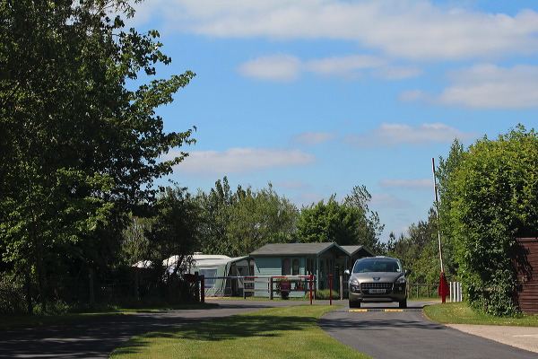 Entrance drive and touring field