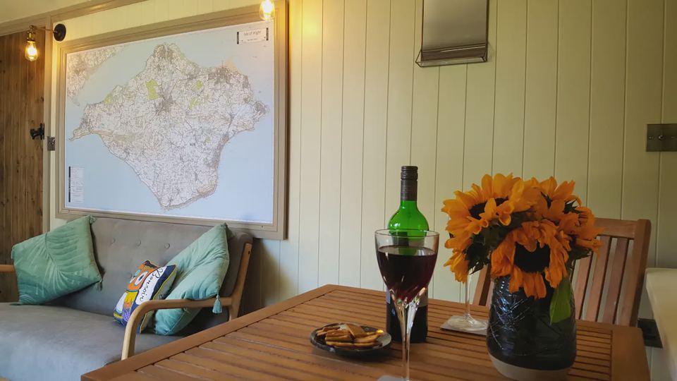 Table and sofa inside the hut