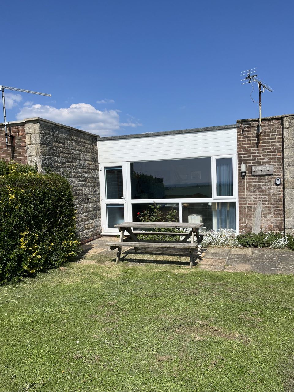 Bungalow with picnic bench