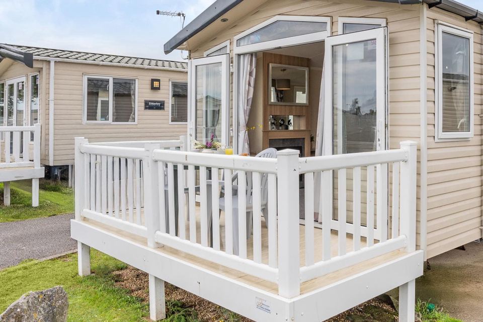 Caravan with cream decking