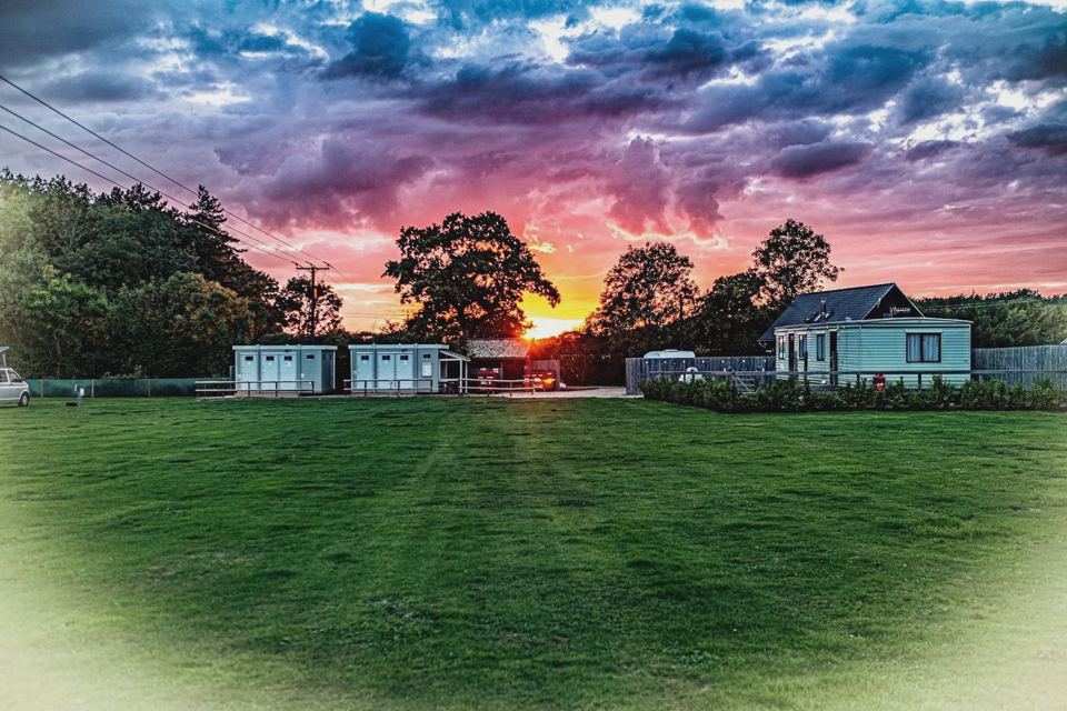 Camping field at sunset