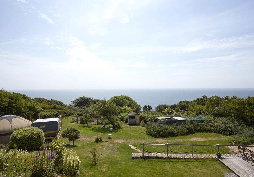 Lawn sloping towards the sea