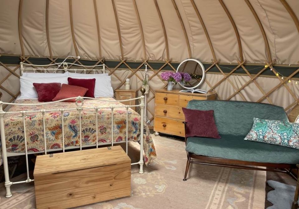 Inside the yurt with double bed