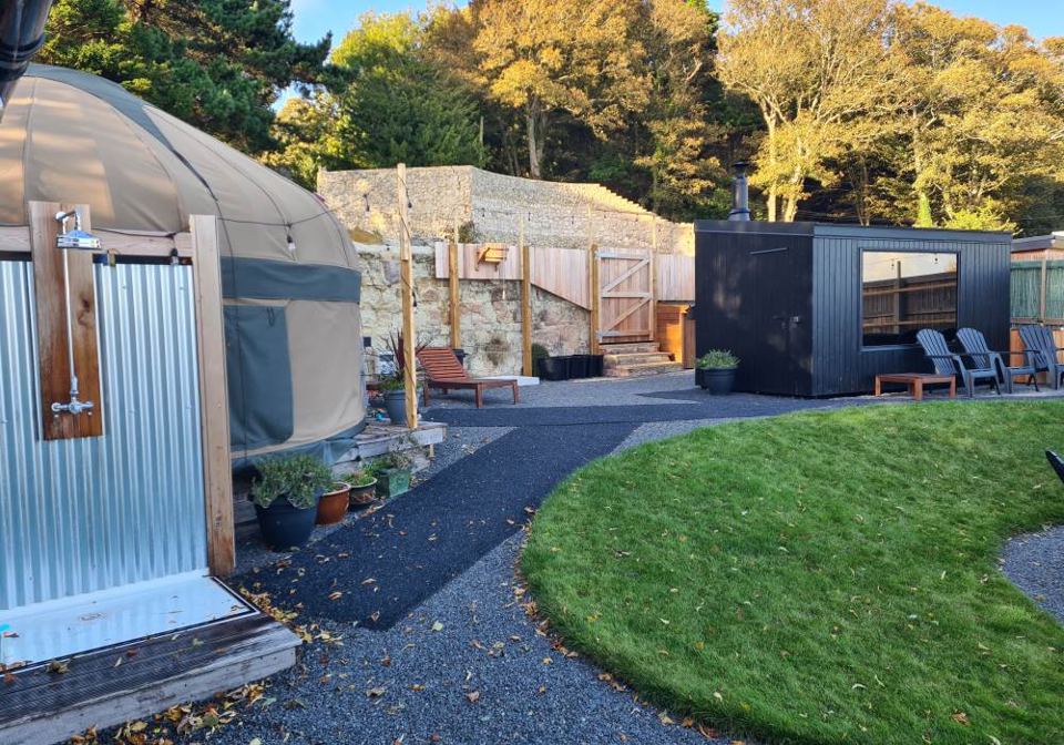 Yurt with outdoor shower and lawn