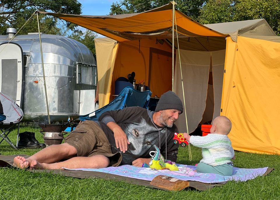 Airstream with awning tent
