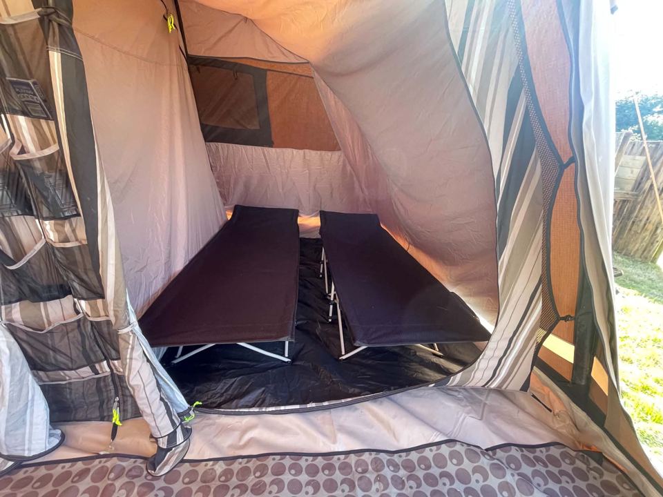 Tent bedroom with camp beds