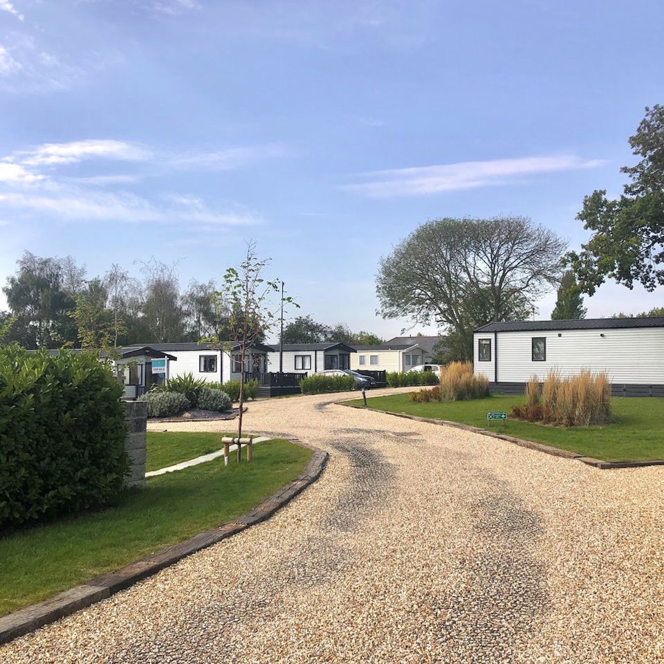 Caravans along a gravel drive