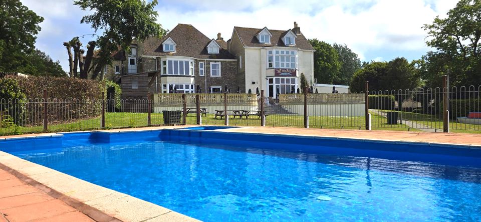 Outdoor pool by the manor house