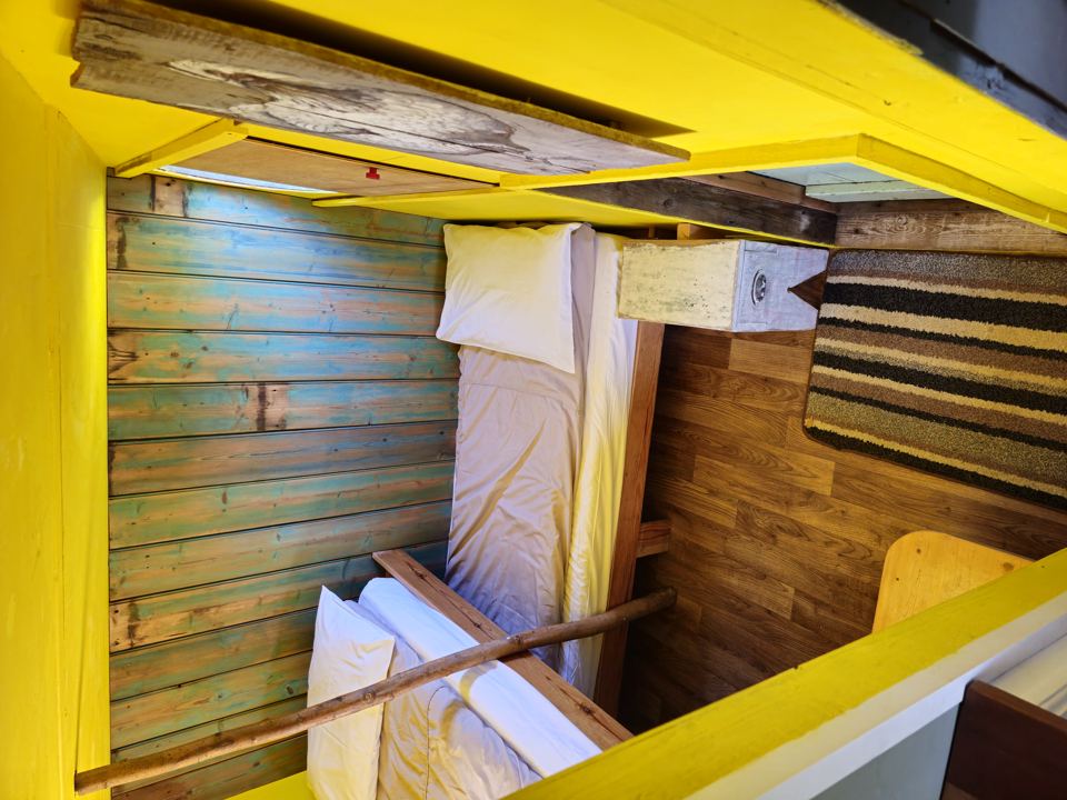 Bunk beds in a wooden unit